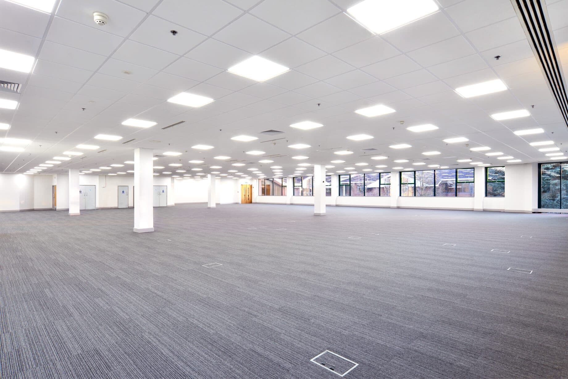 Bright commercial open-plan office with finished ceiling