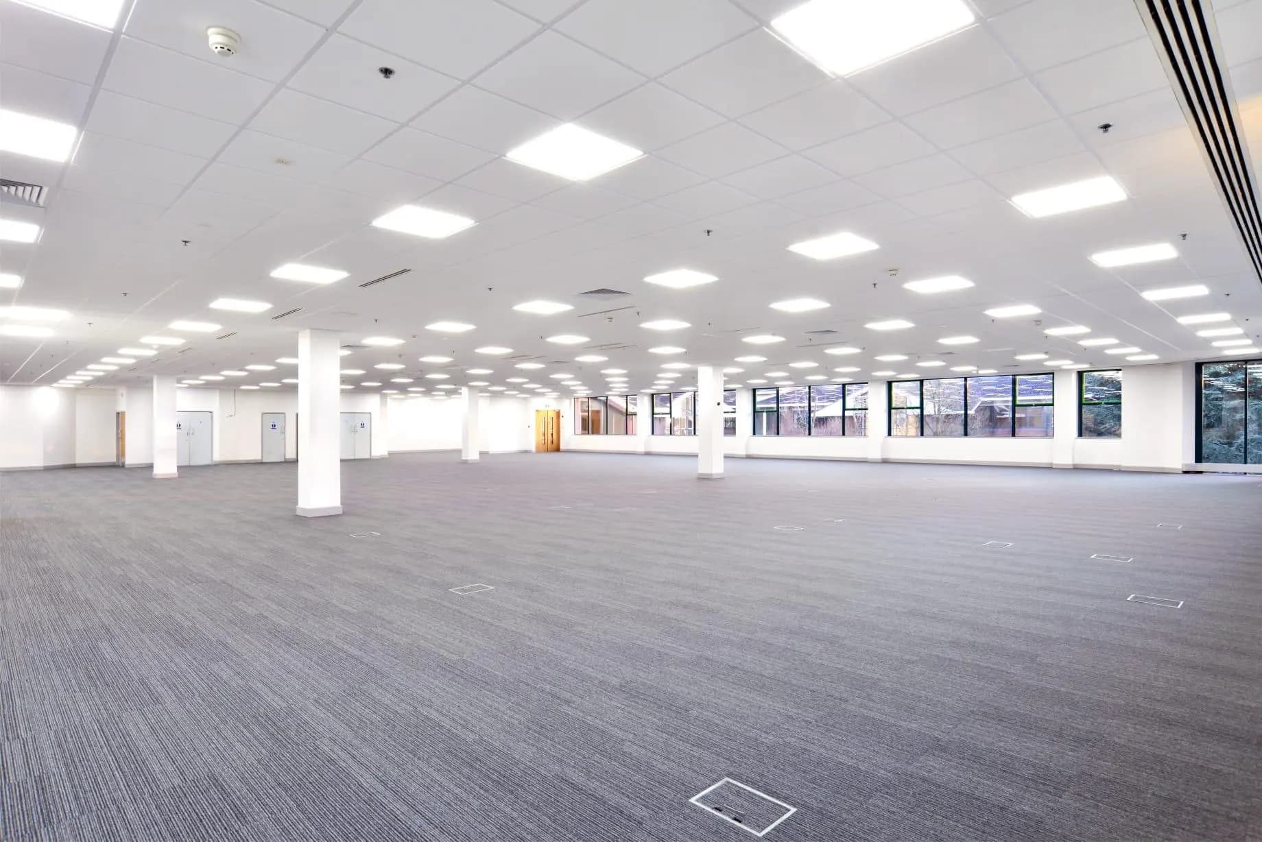 Bright commercial open-plan office with finished ceiling
