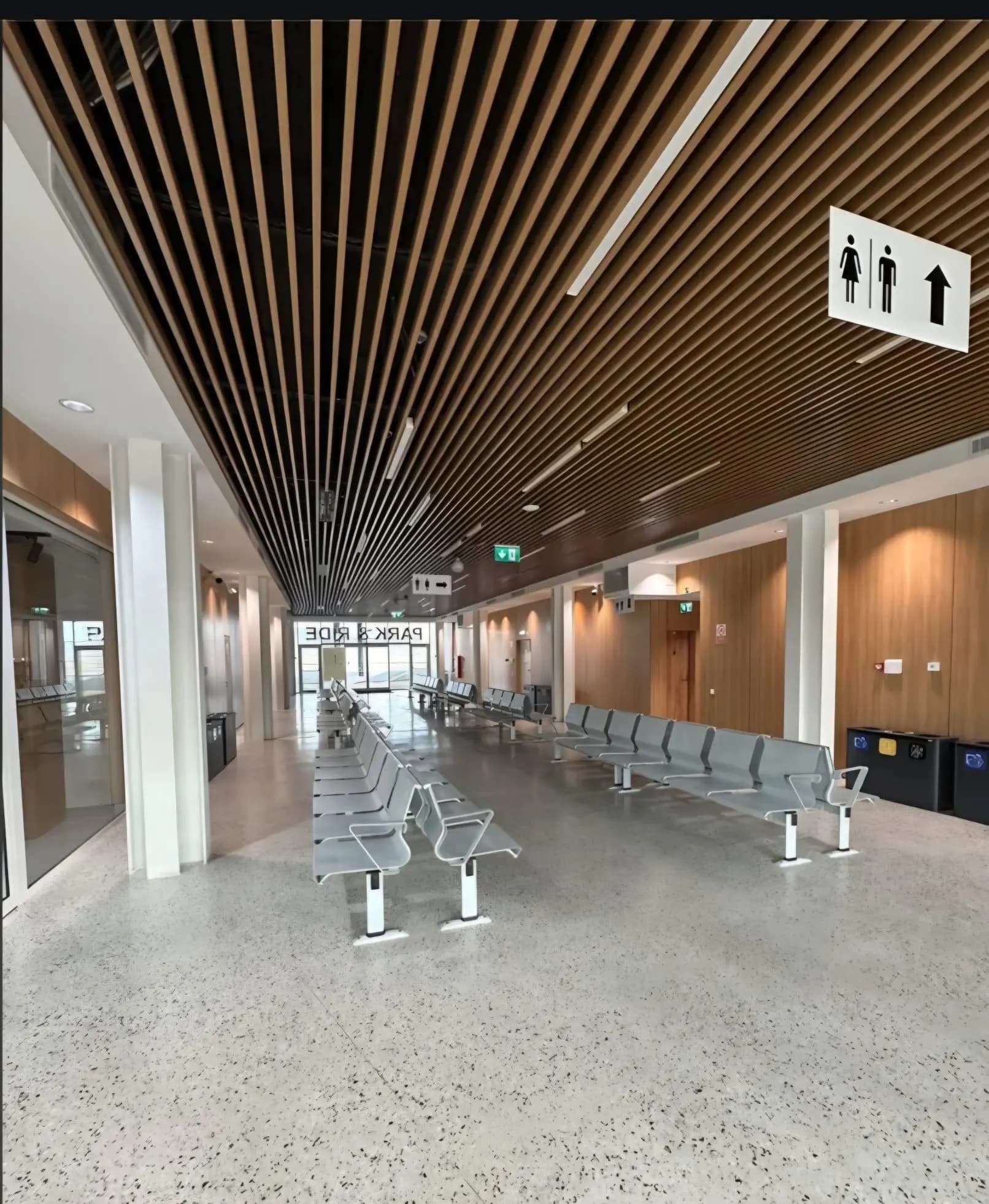 Commercial corridor with timber slat ceiling treatment